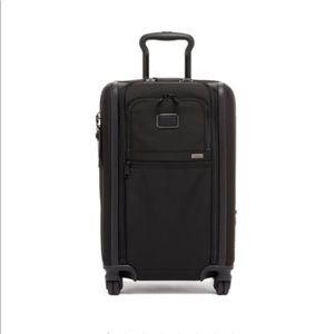 Tumi international 4 wheel carry-on